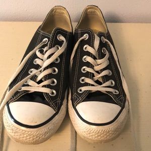 Uses black and white converse